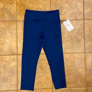 New with tags. Zyia navy pocket light n tight hi-rise capri leggings